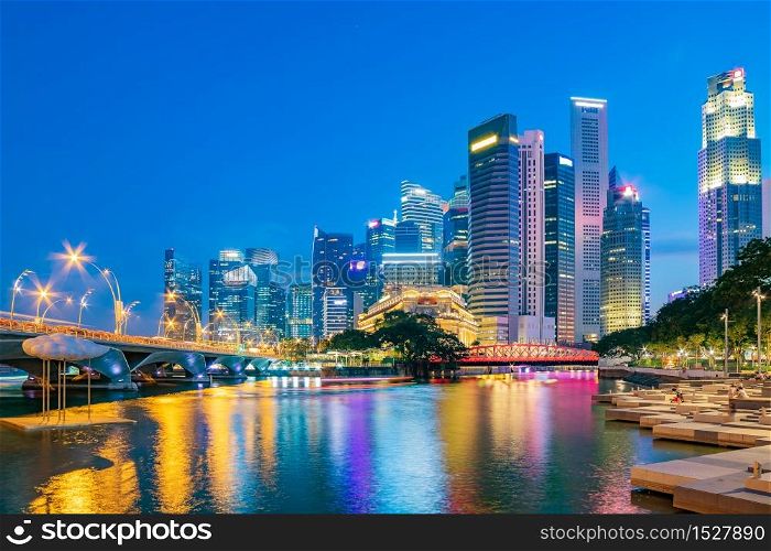 Singapore financial district skyline at Marina bay on twilight time, Singapore city, South east asia.. Singapore financial district skyline at Marina bay on twilight time.