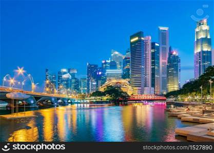 Singapore financial district skyline at Marina bay on twilight time, Singapore city, South east asia.. Singapore financial district skyline at Marina bay on twilight time.