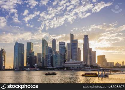 Singapore - January 07, 2017: Singapore Cityscape Financial building with Dramatic Cloud in Marina Bay area Singapore,Boat Quay Golden Hour, Urban Dusk
