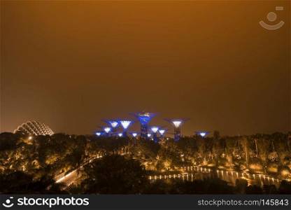 SINGAPORE, July 12, 2018: Show of Super Trees Grove at Gardens by the Bay during the night, in Singapore, on July 12, 2018