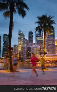 Singapore night life, people jogging in downtown