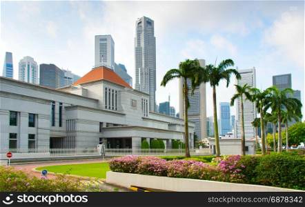 Singapore Parliament building and Downtown Core architecture on a background