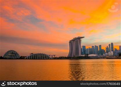 Singapore. Sand Beach Hotel, Dome of Flowers and skyscrapers. Colorful sunset sky. Colorful Sunset Sky over Singapore
