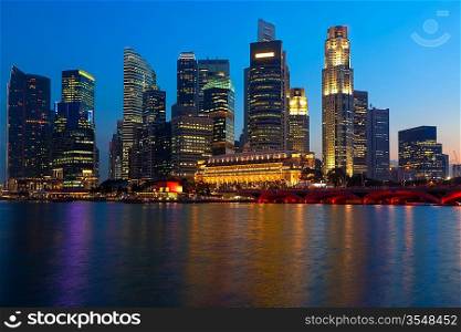 Singapore skyline and river in evening