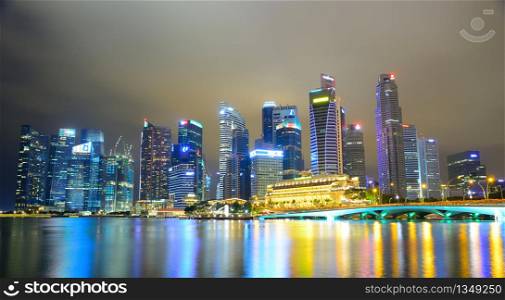 Singapore skyline at Marina bay sands city. Skyline at night time in Singapore.