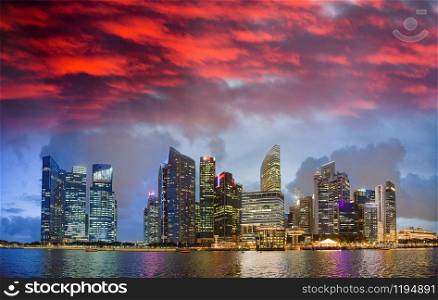 Singapore skyline in Marina Bay at sunset.