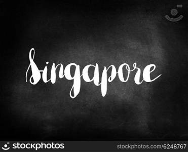 Singapore written on a blackboard