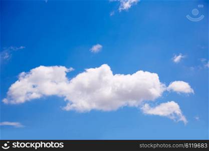 Single big cumulus cloud in blue summer sky