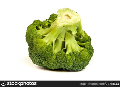 Single broccoli floret isolated on white background with soft drop shadow.