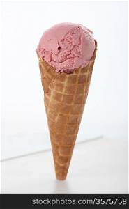 Single cone of pink ice-cream