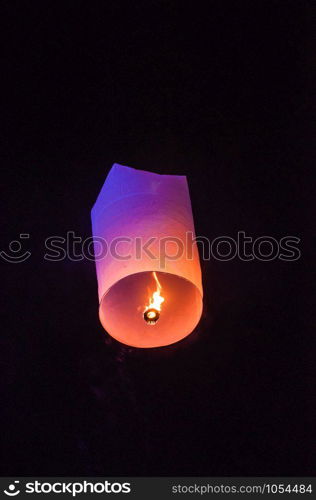 Single Floating Lantern during Loy Kratong Festival in Thailand