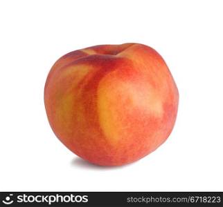 single fresh peach on white background