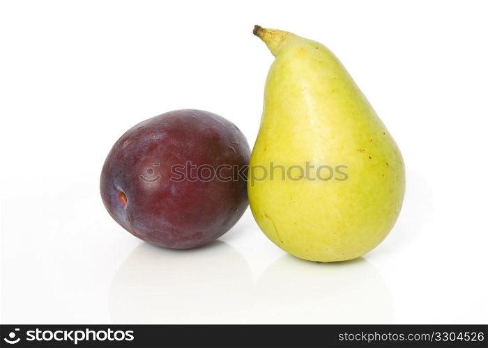 single plum and pear isolated on white background