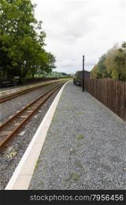 Single railway track, at station, UK narrow gauge, Vale of Rheidol Railway, Ceredigion, Wales, United Kingdom, Europe.