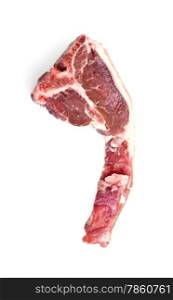 Single raw lamb loin chop with fat around the meat isolated over white background.