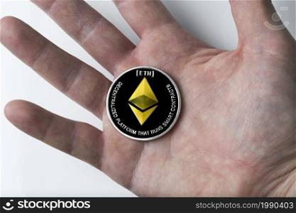 Single real coin from Cryptocurrency Ethereum Silver, isolated on white background. Modern currency.. Single Real coin of cryptocurrency Silver Ethereum isolated on white background