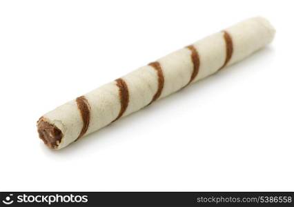 Single waffle roll filled with chocolate isolated on white
