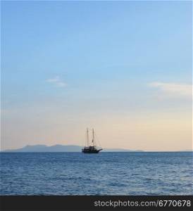 single yacht and blue sea