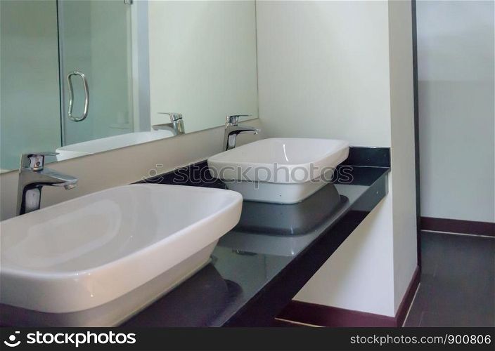 Sinks in two water basins.