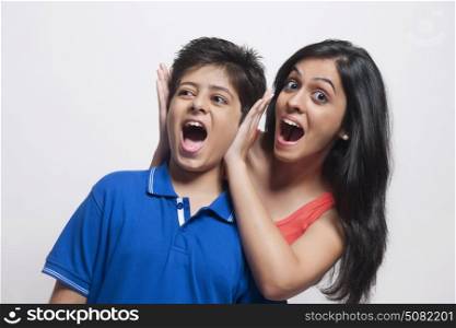 Sister and brother shouting