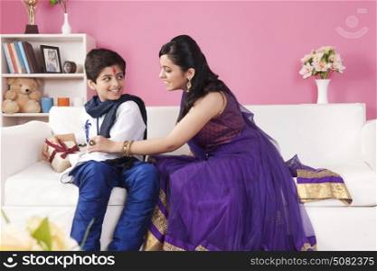 Sister snatching gift from her brother at the festival of Rakhi