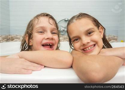 Sisters are bathing