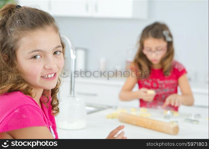 Sisters baking in the kitchen