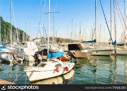 Sistiana, Trieste, Italy - July 28, 2015: Pleasure Boats moored in the harbor.
