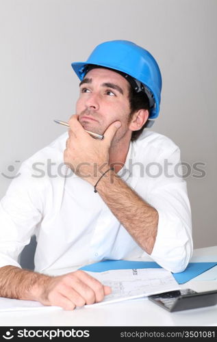 Site manager in office with thoughful look