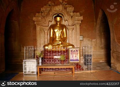 Sitting Buddha in old buddhist pagoda in Bagan, Myanmar