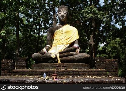 Sitting Buddha in old Si Satchanalai near Sukhotai, Thailand