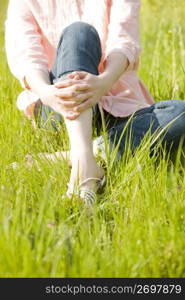 Sitting in a field