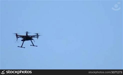 six engine drone flies and shoots video