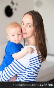 Six months old baby boy with his mother