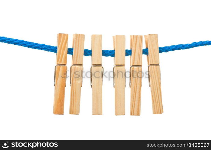 Six pegs hanging in a rope, white isolated background.