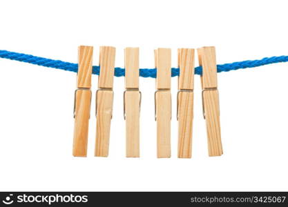 Six pegs hanging in a rope, white isolated background.