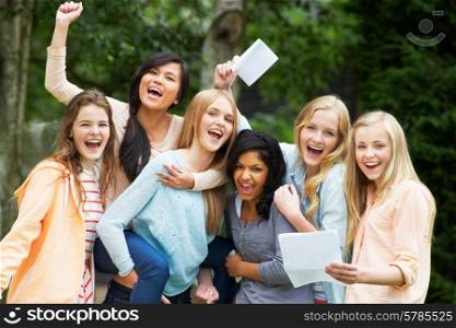 Six Teenage Girls Celebrating Successful Exam Results