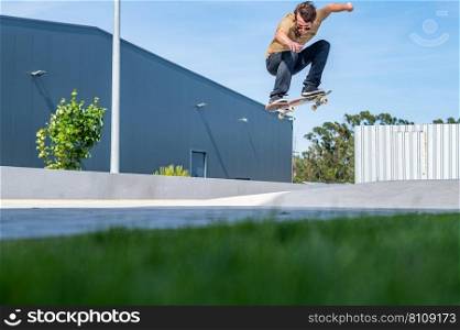 Skateboarder doing ollie trick on a urban scene.