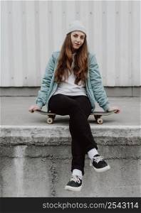 skater girl urban sitting skate