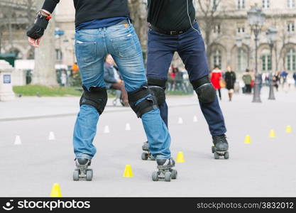 Skating teacher teaching a student skating