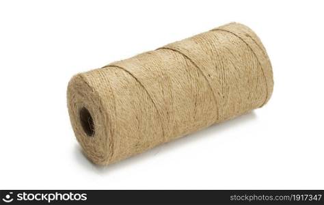 skein of brown eco-friendly jute rope isolated on white background
