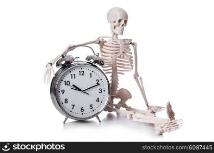 Skeleton with alarm clock on the white