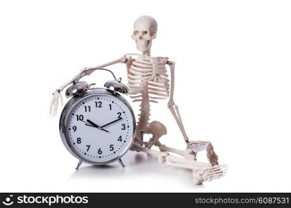 Skeleton with alarm clock on the white