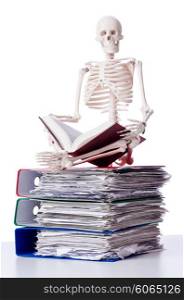 Skeleton with pile of files on white