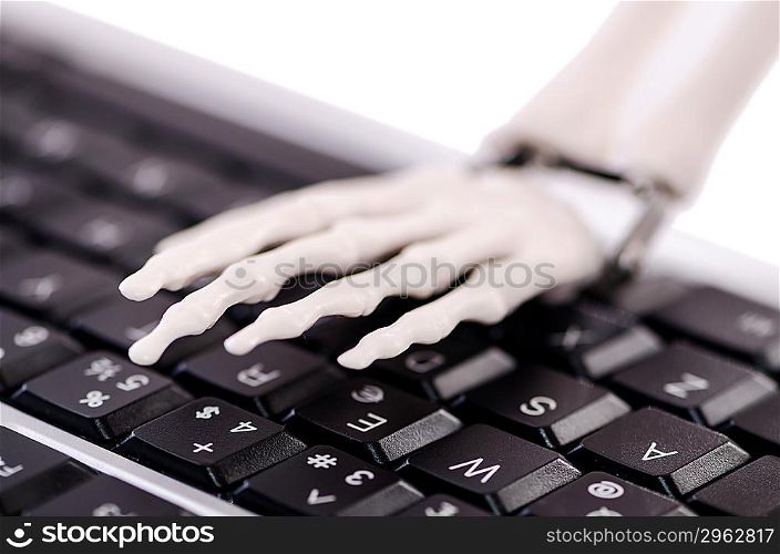 Skeleton working on the keyboard