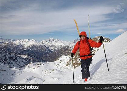 Ski-Climber on a snowy ridge, Italian alps.