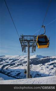 Ski lift booths at a ski resort. Ski lift in the high winter mountains.. Ski lift booths at a ski resort.