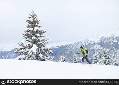 Ski touring with lots of fresh snow one man uphill