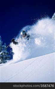 Skier in deep powder snow
