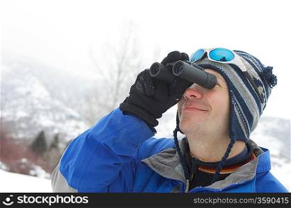 Skier Looking Through Binoculars
